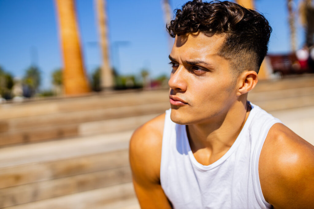 Curly Top with Skin Fade Haircut Styles